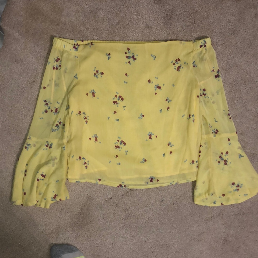 Large designer Lab yellow off the shoulder long sleeve blouse.